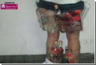 В Саудовской Аравии задержали спрятавшего на себе 14 бутылок контрабандиста