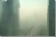 Опубликовано видео откутывающего Пекин смога