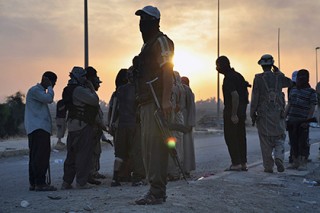 За попытку сдаться курдам казнены 18 боевиков ИГ
