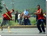 В Венесуэле подрались сторонники и противники Чавеса