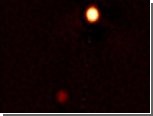 Астрономы получили самые четкие фото Плутона и Харона