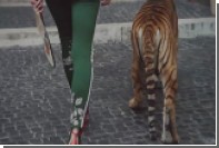 Gucci пустил тигра и жирафа гулять по римским улицам